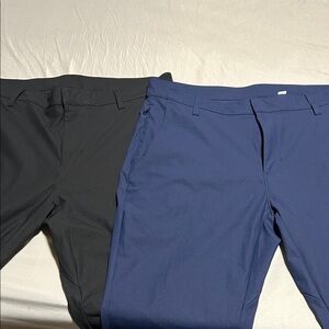 Fabletics The Don Slim Fit pants black and blue pair 36x30
